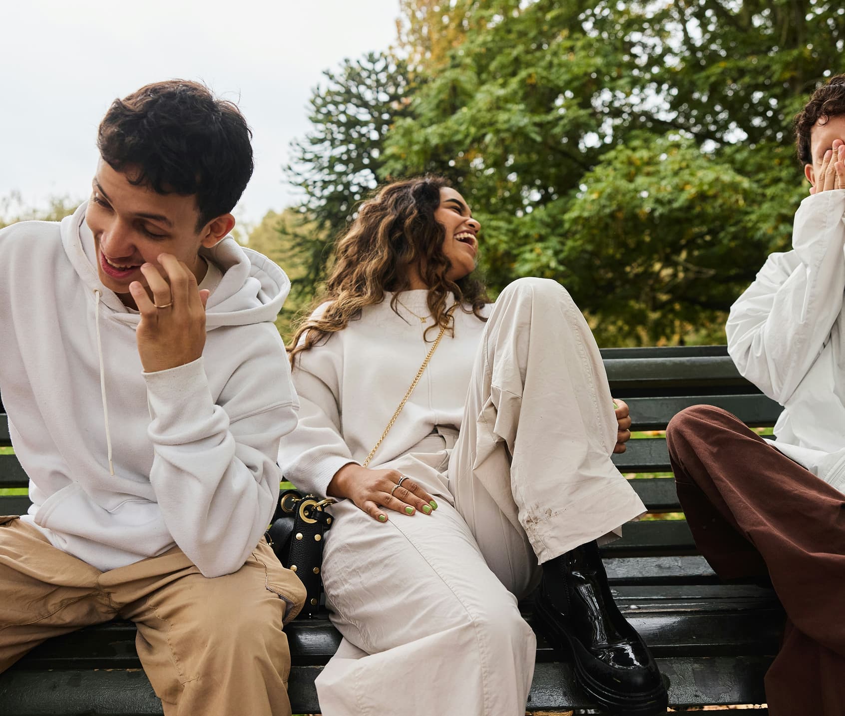 Happy students discussing good offer for renting a room